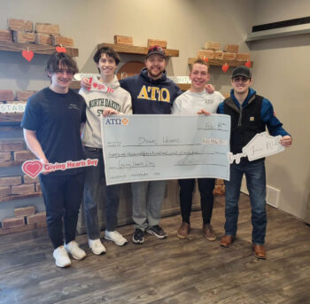 Brothers of the Epsilon Delta Chapter Donate $21,446 to DownHome Charity