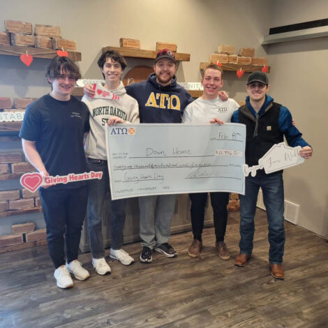Brothers of the Epsilon Delta Chapter Donate $21,446 to DownHome Charity