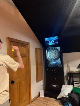 BROTHERS PLAY DARTS