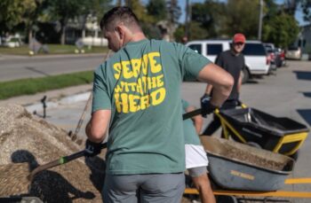 Brothers Serve With The Herd During Homecoming!