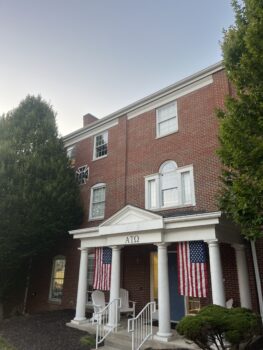Alpha Pi Chapter hangs flags for Patriot Day