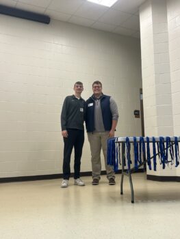 Brothers Serve High School DECA Program