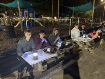 Brothers making S’mores for Community Service