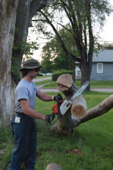 Brother Vredenburgh does community service for habitat for humanity