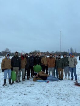 Brotherhood Sledding on Campus