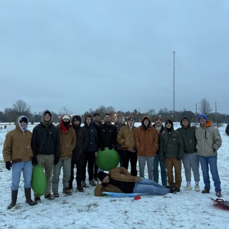 Brotherhood Sledding on Campus