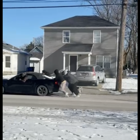 Brothers help Brother Holbrook Move Car Amid Cold Weather