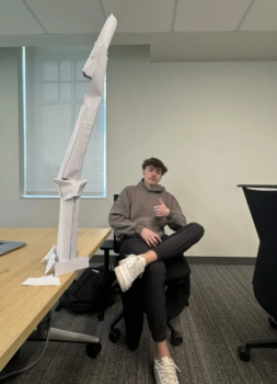 Brother Builds Project in Class