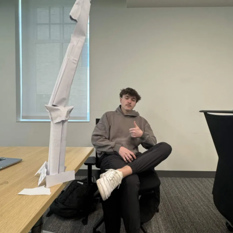 Brother Builds Project in Class