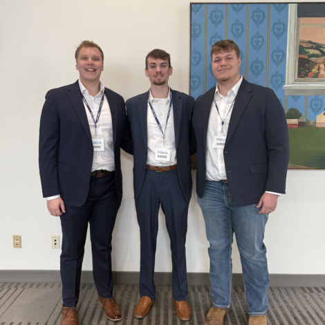 Brothers Judge DECA State Competition