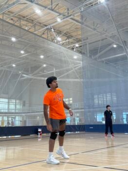 Brother participates in a volleyball tournament