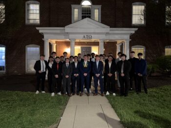 Alpha Pi initiates 22 new brothers